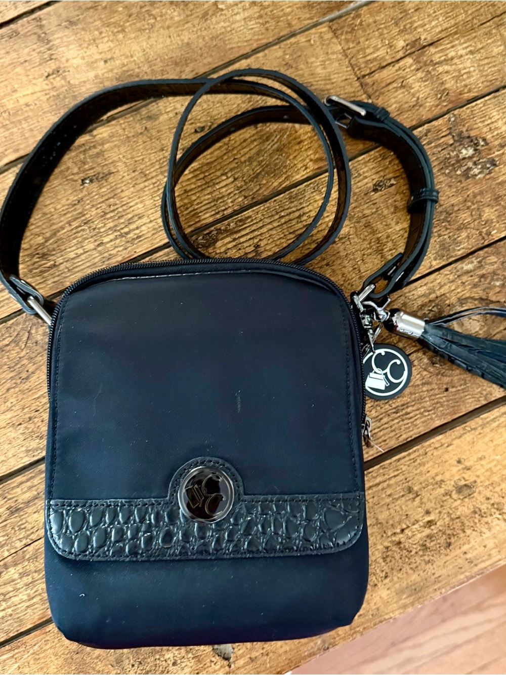 Black Crossbody Bag with Tassel Accent
